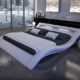 SAM LED-Polsterbett 160x200 cm Look, weiß, Bett aus Kunstleder, LED - Beleuchtung im Kopfteil, geschwungene Optik, als Wasserbett geeignet